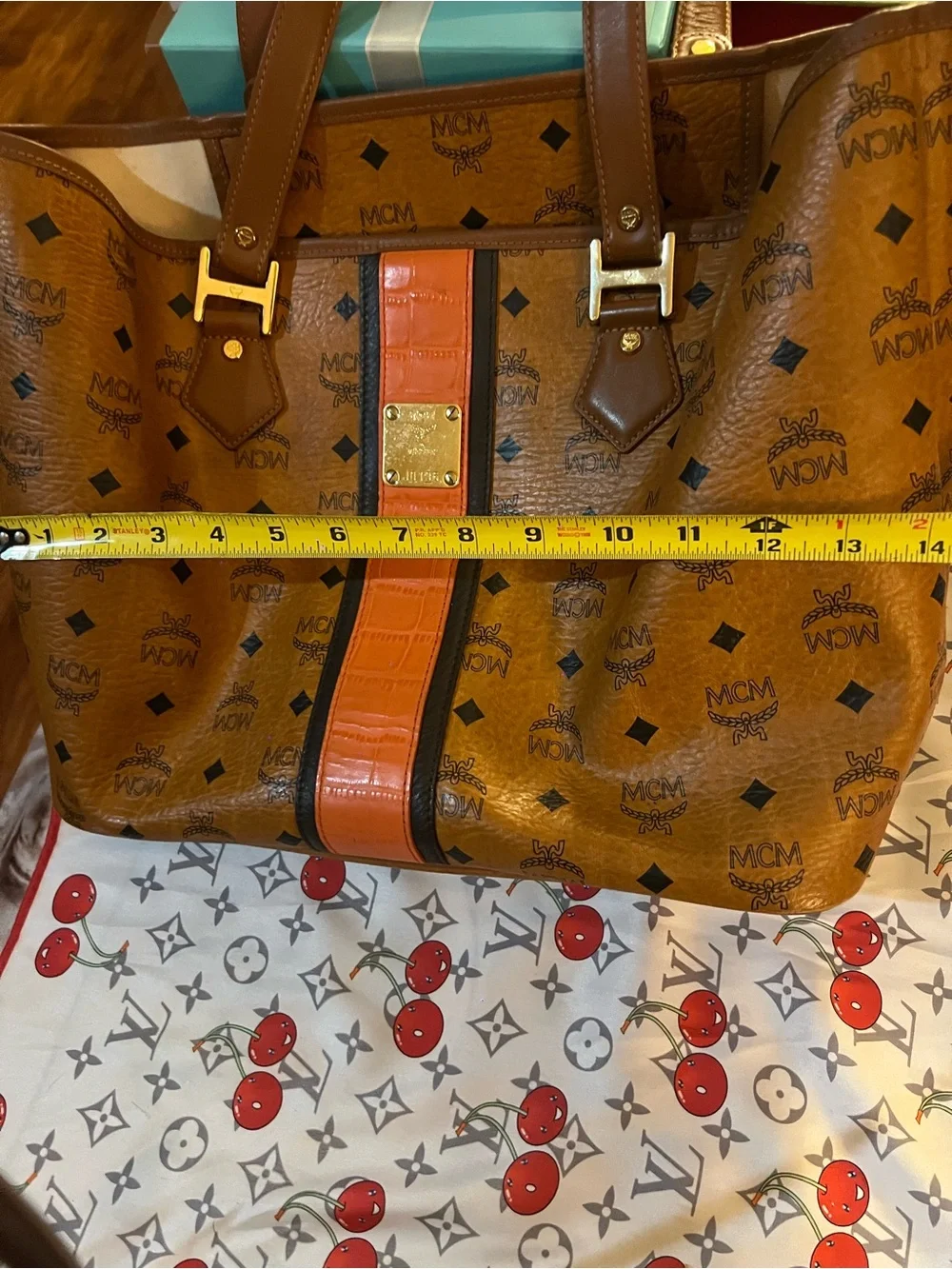 MCM gold tone